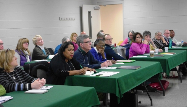 Workshop attendees learning about team leadership essentials. 